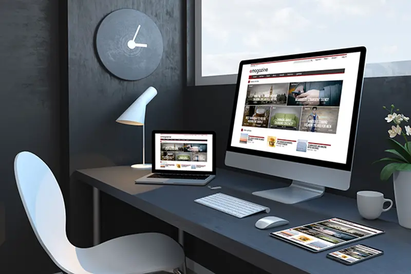 Minimalistic Website design on laptop and ipad screen