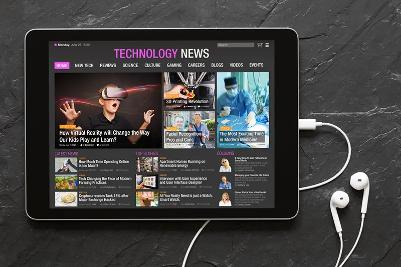 Tech news website on tablet.